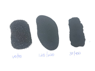Three different grades of grit for lapping in lapidary on a white background