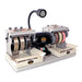 front side angle of Cabking cabbing machine with 6 grinding and polishing wheels, an overhead LED lamp, splash guards, stone trays and water for each wheel.