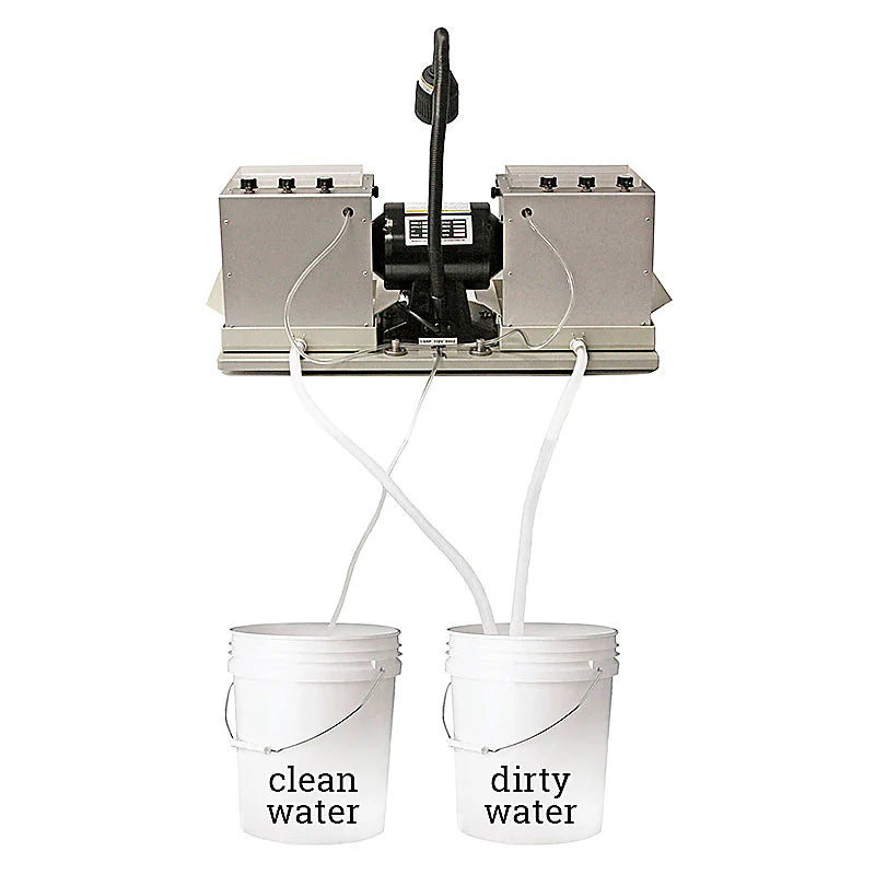 back view of cabking cabber showing the no-pass water system that does not recirculate water and connects to each wheel with two buckets of water for clean water and dirty water