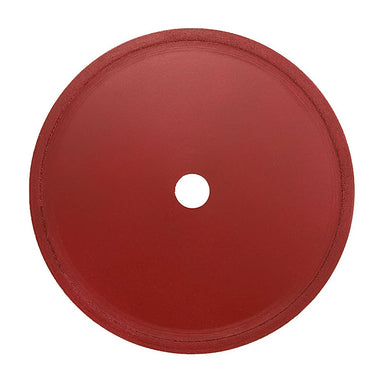 closeup of red cabking sintered diamond blade on white background