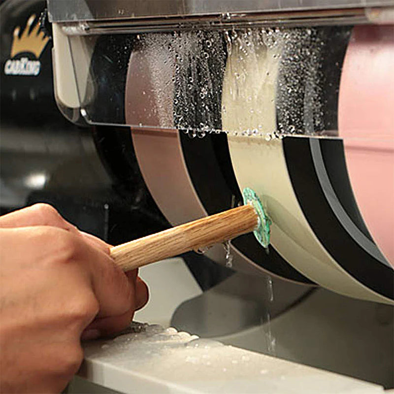 close up of wet grinding and polishing on cabking 6 cabochon machine